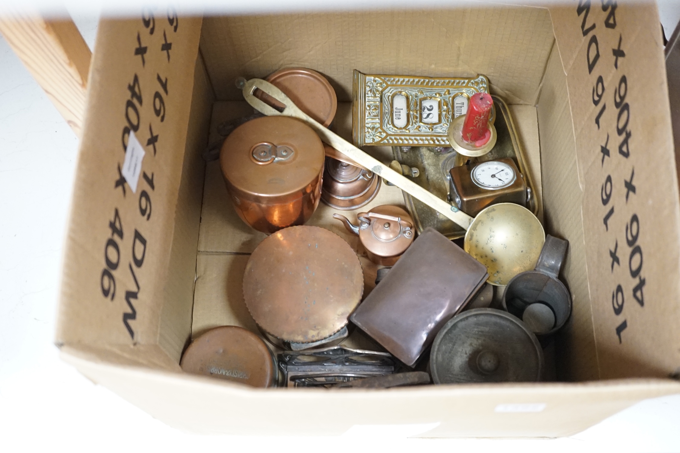 A Victorian copper helmet scuttle, two copper kettles, two trivets and a box of mixed copper and brass wares etc., scuttle 40cm deep. Condition - fair to good